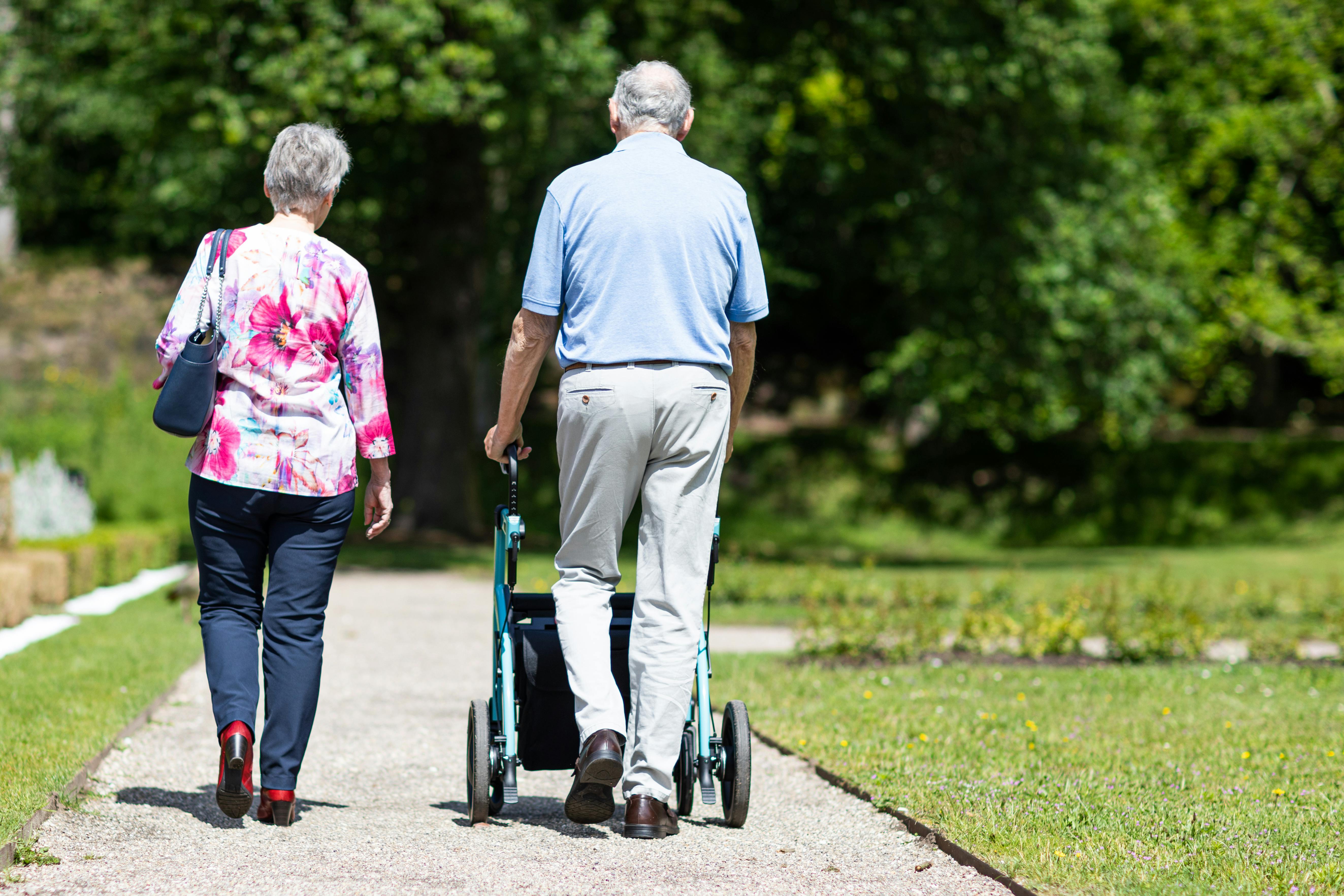 Senior using a walker outdoors with support from Ray's Drugs medical equipment